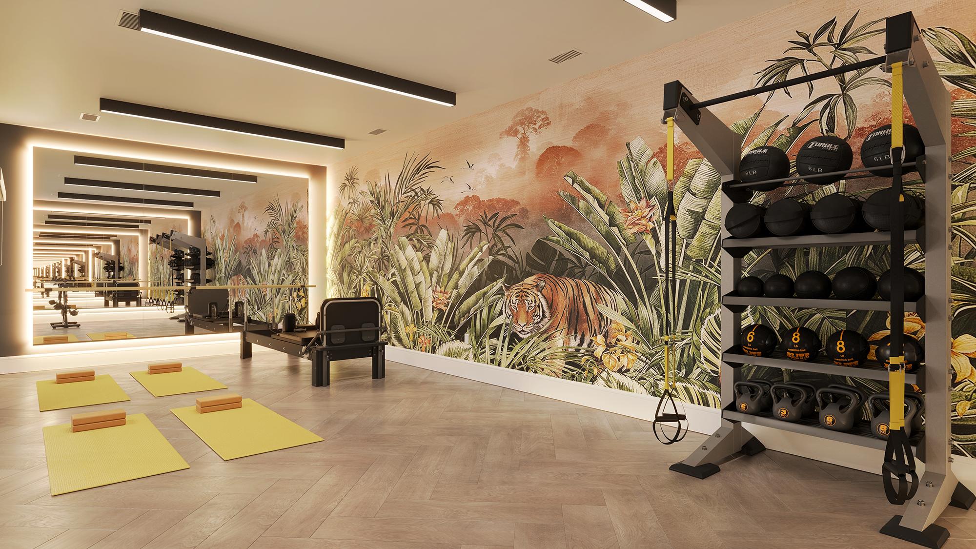 Sterling Tiger Valley Home gym with yellow mats, weights, a mirror wall, and a jungle mural featuring a tiger and tropical plants.